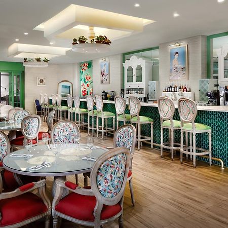 Millennium Place Ad Dawhah Esterno foto The interior of the restaurant