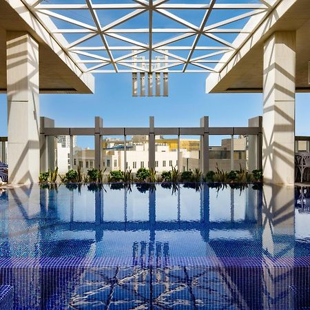 Millennium Place Ad Dawhah Esterno foto The rooftop pool at the Four Seasons Hotel, Cairo