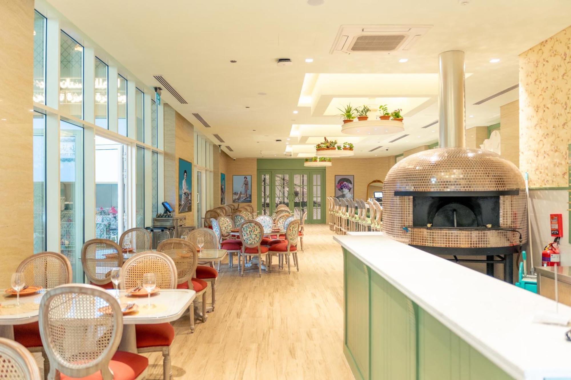 Millennium Place Ad Dawhah Esterno foto The restaurant
